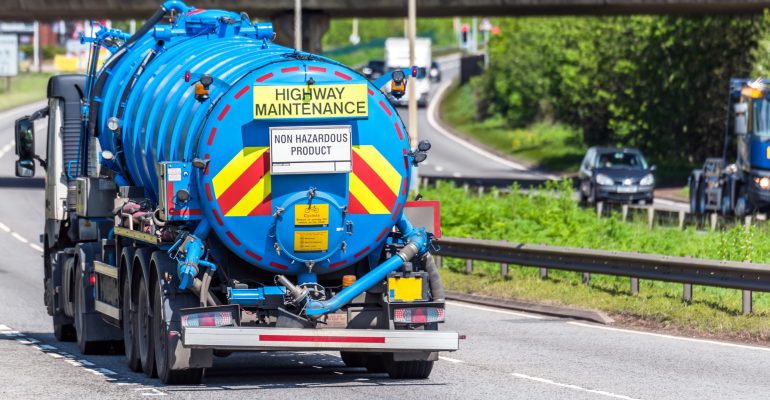 tanker lorry truck on uk motorway in fast motion.